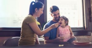 couple with their daughter